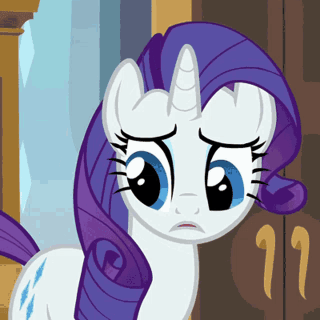 a cartoon pony with a purple mane and a white horn
