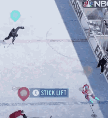 a hockey game is being played on the ice with a nbc sign in the background