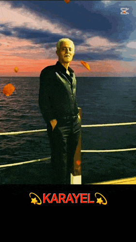 a man in a black shirt stands on a balcony overlooking a body of water with the word karayel on the bottom