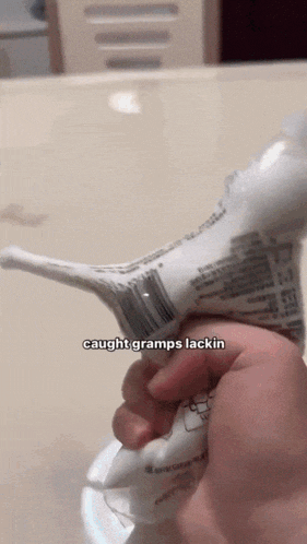 a person is squeezing a tube of toothpaste and the caption says caught gramps lacking