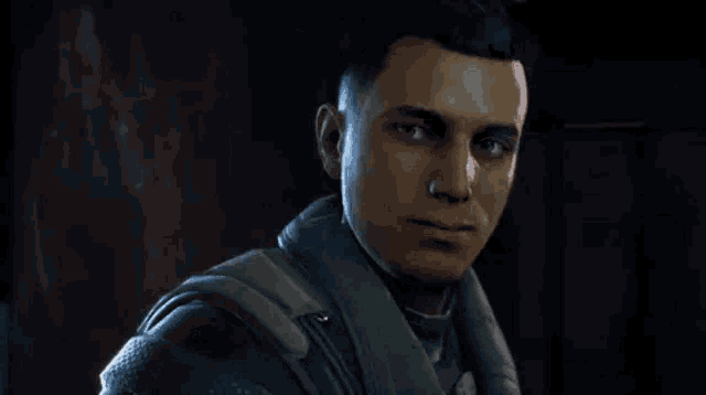 a close up of a man 's face in a video game looking at the camera .