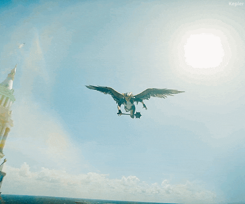 a person in a costume with wings is flying in the sky with the word kepler visible