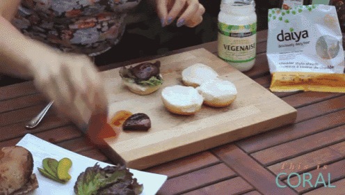 a bottle of vegenaise sits on a cutting board