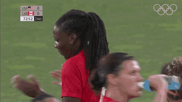 a soccer game between the usa and canada is being played