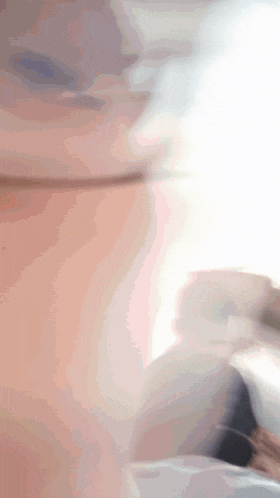 a close up of a person 's neck with a white background