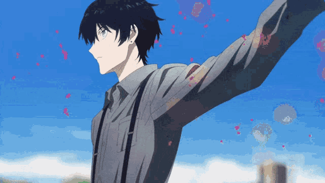 a man with his arms outstretched is surrounded by pink petals falling from the sky