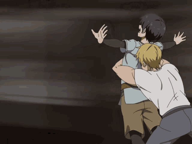 two anime characters are hugging each other in a dark room
