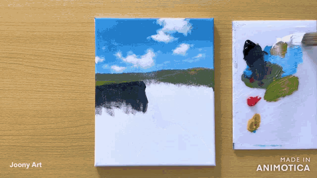 a painting by joony art is being painted on a canvas
