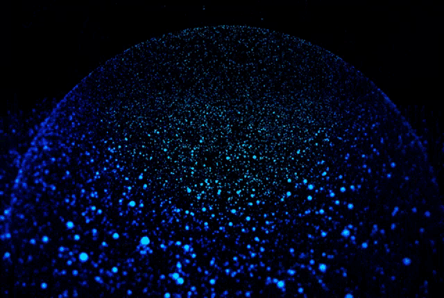 a dark blue background with a sphere in the middle