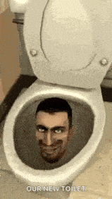 a man is sitting in a toilet with his head sticking out of it .