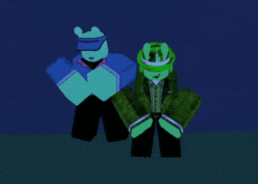 two green cartoon characters are standing next to each other in the dark