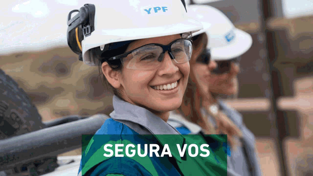 a woman wearing a hard hat that says ypf
