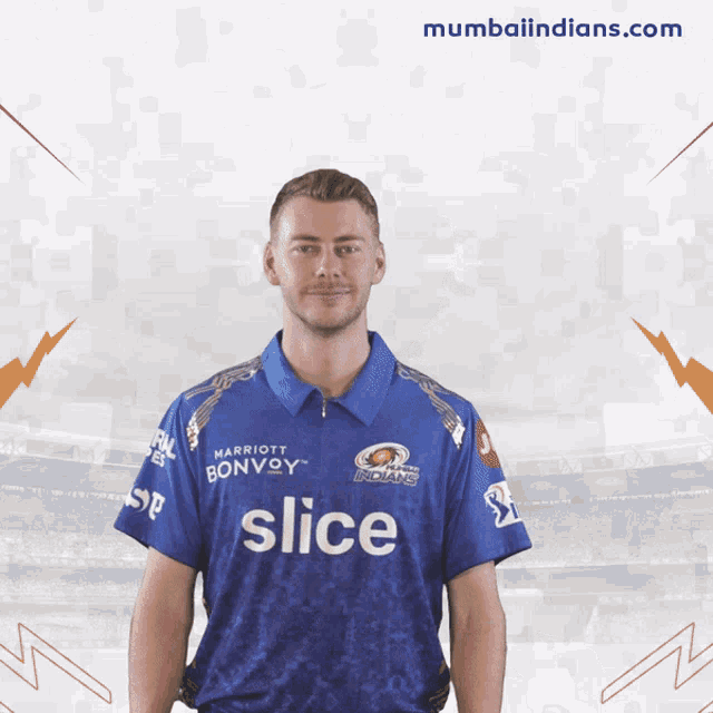 a man wearing a blue shirt that says slice on the front
