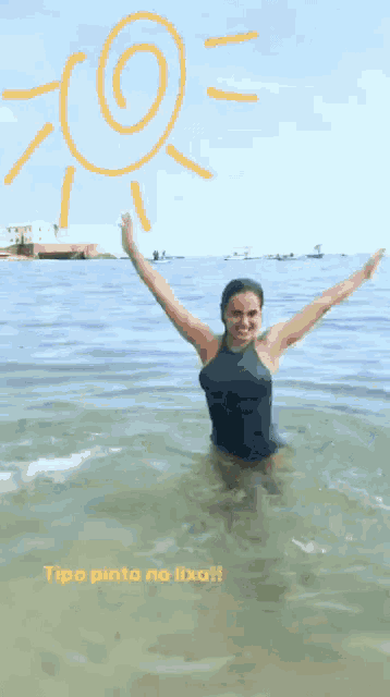 a woman in a bathing suit stands in the water with her arms outstretched and the words tipo pinto no lixo below her