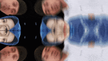 a blurred image of a person 's face with a blue circle in the middle