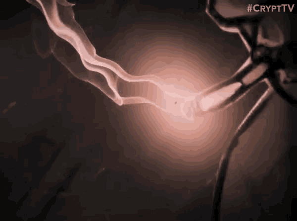 a close up of a lightning bolt with the words #crypttv visible