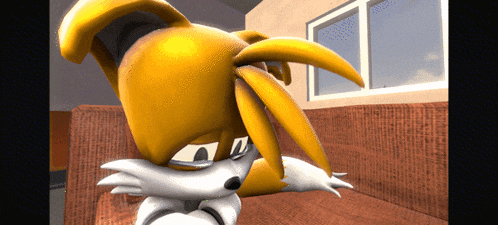 a cartoon of tails sitting on a couch