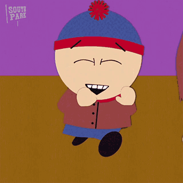 stanley from south park is standing in front of a sign that says south park on it