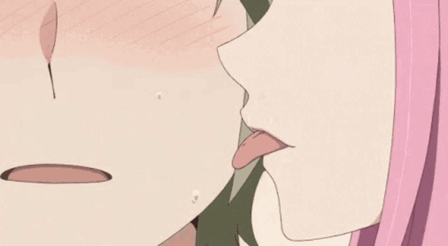 a girl with pink hair is kissing a boy with blonde hair