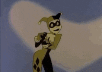 a cartoon of harley quinn holding a card in front of a heart shaped background .