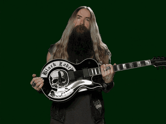 a man holding a guitar with a sign that says your parents think you 're pathetic on it