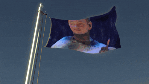 a blue flag with a picture of a man giving a thumbs up