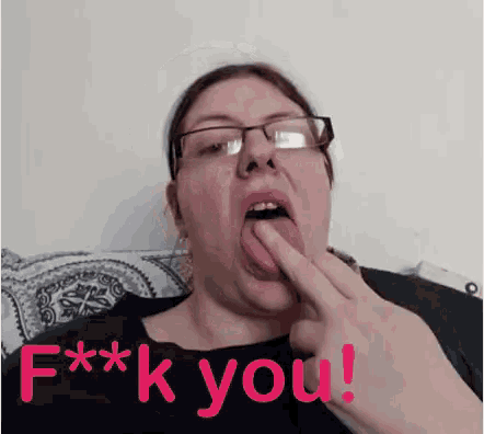 a woman with glasses is sticking her tongue out with the words f ** k you written below her