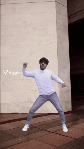 a man is dancing in front of a brick wall with a viggle.ai logo