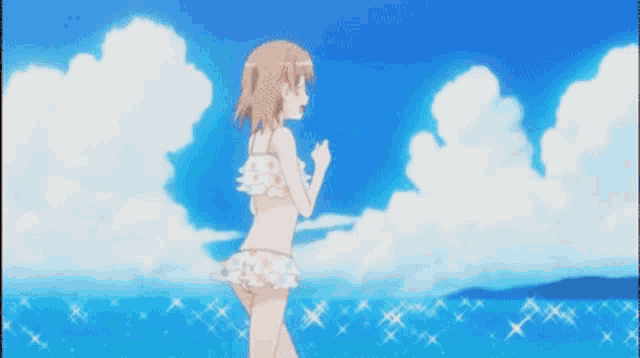 a girl in a bikini says it 's so much fun in front of a blue sky