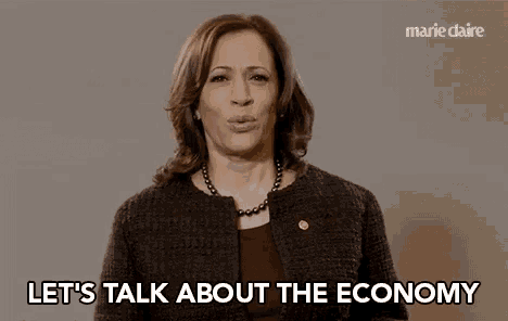 a woman says let 's talk about the economy in front of a marie claire logo