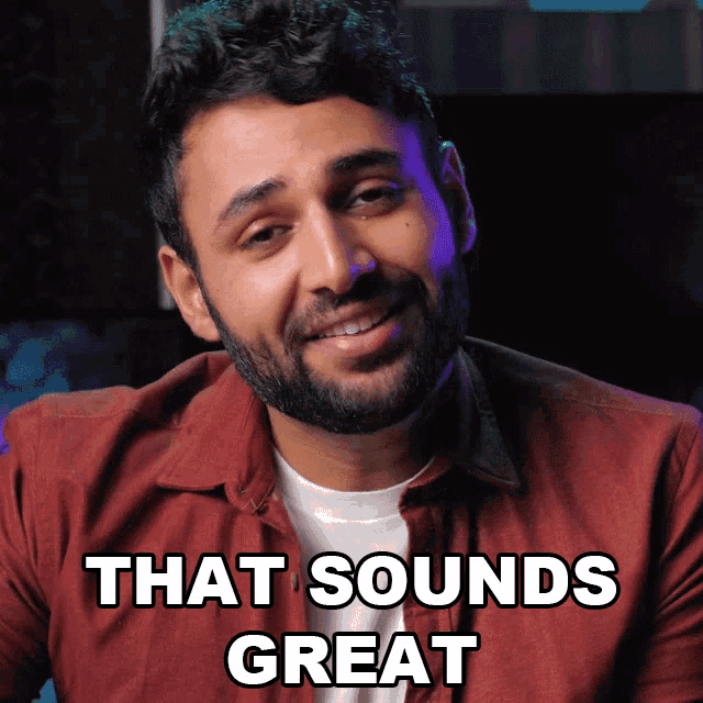 a man with a beard is smiling with the words that sounds great below him