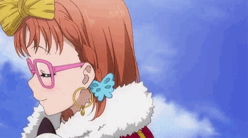 a girl with glasses and a bow on her head