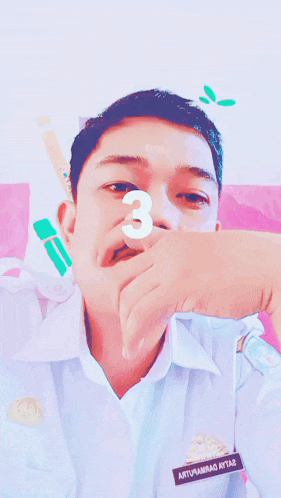 a picture of a man with a name tag that says aditya muhammad aytas