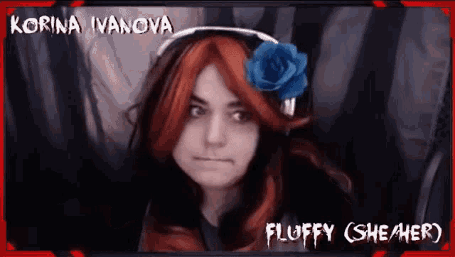 a woman with red hair has a blue rose in her hair and the name korina ivanova on the bottom