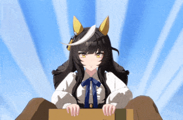 a girl with long black hair and yellow horns is holding a cardboard box