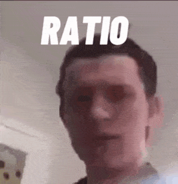 a close up of a man 's face with the word ratio written above him .