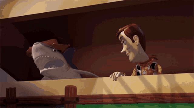 woody and a stuffed shark from toy story