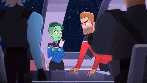 a group of cartoon characters are standing around a table and one of them has a green haircut