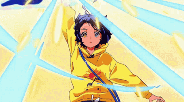 a girl in a yellow shirt is holding a blue ribbon in her hand .