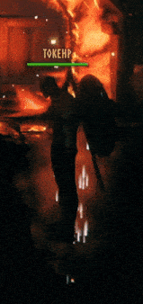a video game screen shows a man standing in front of a sign that says " tokenp "