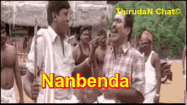 a group of men are standing in front of a sign that says nanbenda ..