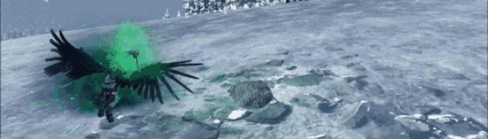 a black bird with green wings is flying over a snowy landscape