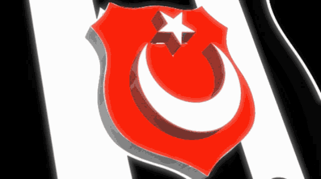 a red shield with a white crescent moon and star