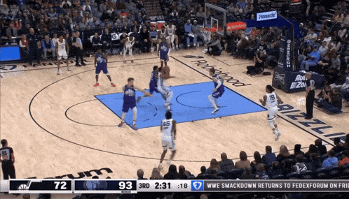 a basketball game is being played on a court that says robinhood on the side