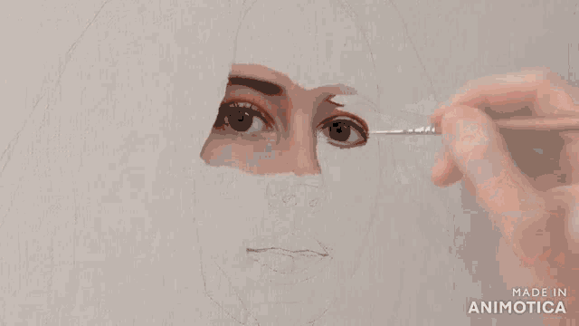 a drawing of a woman 's face is being made by animatica