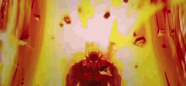 a cartoon character is standing in front of a fire explosion .