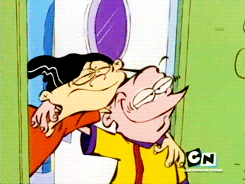 two cartoon characters are standing next to each other with cn written on the bottom