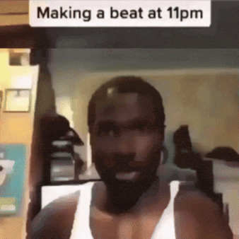 a man is making a beat at 11 pm