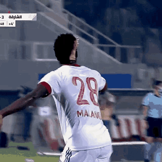 a soccer player with the number 28 on the back of his shirt