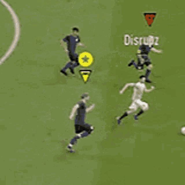 a group of soccer players are playing on a field and one of them says the goon says no